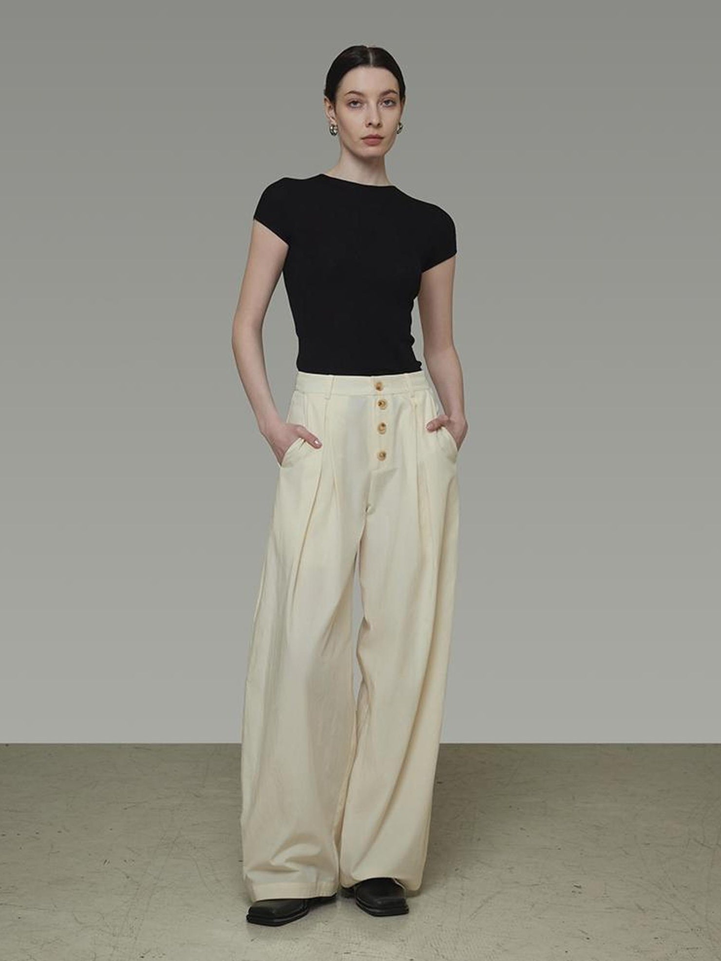 UNSPOKEN High Waist Pleated Wide Leg Button Detail Minimalist Lyocell Pants