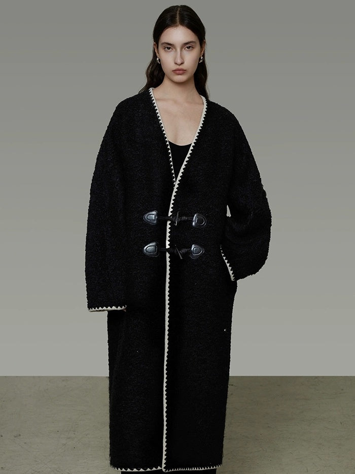 UNSPOKEN Warm Sheep Wool Midlength Loose Minimalist Commuter Black Horn Toggle Coat